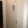 Vilket lyft i vår hall! Innerdörr Öland - 1-spegel - Runt glas - Massiv